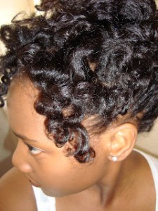 Shea butter helps to create definition like this bantu knot out.