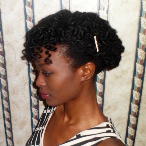 I achieved this Bantu Knot Updo by making small bantu knots in my hair and just pinning the hair up