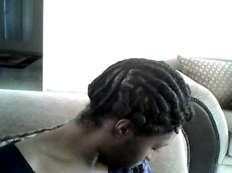 I flat twisted damp hair setting, it with a mixture of shea butter and flax seed gel. I bantu knotted the ends for extra curl.