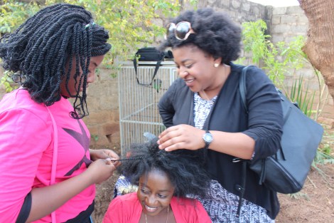 This lady was pleasantly surprised to find that her daughter was a natural at flat twisting after a few minutes practice on Chiteu's hair.