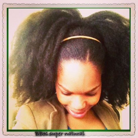 Afro-puff Ponytail - This Afro puff ponytail was achieved on stretched hair by securing my hair in a ponytail using a big hair band- I used gel to sleek down my edges and used a hair band to accessorise and flatten my thick hair.