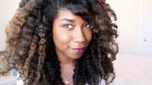 We've watched Whitney of Naptural85 grow her hair from a TWA to this.