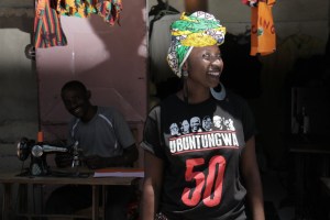 Behind the scenes one of the tailors smiles as we take a shot. I promised him free promo so please head to Mtendere for your custom made designs. 